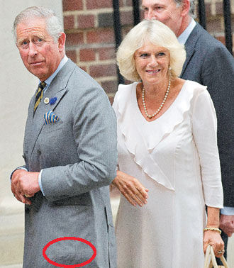 查爾斯王子最近一掃浮華氣派，多次被媒體拍到穿同一件下擺有大塊補丁的灰色西裝外套。歐新社圖